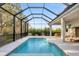Relaxing screened-in pool area, perfect for outdoor entertainment and leisure at 5203 Title Row Dr, Bradenton, FL 34210