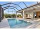 The screened-in pool offers a place for fun and entertaining at 5203 Title Row Dr, Bradenton, FL 34210
