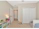 Bright bedroom with ample closet space and playroom at 5307 Senza Trl, Palmetto, FL 34221