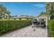 Driveway with shed and parked jetskis on a trailer at 577 Corwood Dr, Sarasota, FL 34234