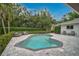 Backyard pool with surrounding brick pavers and multiple seating areas at 577 Corwood Dr, Sarasota, FL 34234