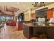 Spacious kitchen with a large island, custom cabinets, and an open layout connected to the living area at 7580 Preservation Dr, Sarasota, FL 34241