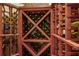 Wine cellar with wooden shelves and bottles of wine at 7580 Preservation Dr, Sarasota, FL 34241