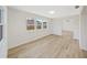 Bright and airy living room with natural light coming through the window at 7797 Barry Ct, Seminole, FL 33772