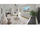 Bright and airy living room featuring neutral decor, modern finishes, and backyard views at 7797 Barry Ct, Seminole, FL 33772