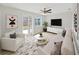 Bright and airy living room featuring neutral decor, modern finishes, and backyard access at 7797 Barry Ct, Seminole, FL 33772