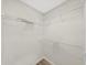 A walk-in closet featuring multiple metal shelves at 7797 Barry Ct, Seminole, FL 33772