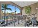 Enjoy the view from this balcony with outdoor seating and space for relaxing with a bike at 808 3Rd W Ave # 214, Bradenton, FL 34205