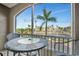 Enjoy picturesque waterfront views from this private balcony with a table perfect for morning coffee at 808 3Rd W Ave # 214, Bradenton, FL 34205