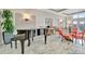 Comfortable common area with piano and ample seating, perfect for socializing at 808 3Rd W Ave # 214, Bradenton, FL 34205