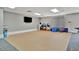 Bright gym area with fitness balls, steps, weights, and ample space for floor exercises at 808 3Rd W Ave # 214, Bradenton, FL 34205