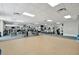 Spacious gym with various workout machines, weight stations, and exercise area at 808 3Rd W Ave # 214, Bradenton, FL 34205