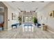 Elegant lobby featuring marble floors, stylish seating, and abundant natural light at 808 3Rd W Ave # 214, Bradenton, FL 34205