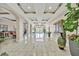 Expansive lobby with marble floors, water feature, and stylish decor at 808 3Rd W Ave # 214, Bradenton, FL 34205