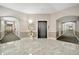 Elegant building lobby featuring marble floors, elevator access, and stylish decor at 808 3Rd W Ave # 214, Bradenton, FL 34205