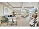 Spacious community meeting room with comfortable seating and abundant natural light at 808 3Rd W Ave # 214, Bradenton, FL 34205