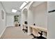 Dedicated office space with built-in desks and ample lighting, ideal for remote work at 808 3Rd W Ave # 214, Bradenton, FL 34205