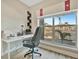 Bright workspace with desk, modern chair, and window providing natural light and beautiful neighborhood views at 808 3Rd W Ave # 214, Bradenton, FL 34205