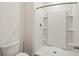 Clean bathroom with white tiled shower stall and modern fixtures at 8600 Milestone Dr, Sarasota, FL 34238