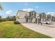 Charming townhome with well-manicured lawn, driveway and attached garage for easy access at 8600 Milestone Dr, Sarasota, FL 34238