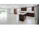 Spacious kitchen with stainless steel appliances and island at 9215 Royal River Cir, Parrish, FL 34219
