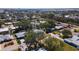 The single-story home is located in a neighborhood with mature trees and has an attached garage at 923 Dawn St, Venice, FL 34285