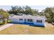 Beautiful single-story home featuring a manicured lawn, front yard and attached garage in a desirable neighborhood at 923 Dawn St, Venice, FL 34285