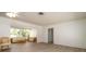 Bright living room open to a sunroom with natural light at 923 Dawn St, Venice, FL 34285