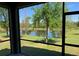 Enjoy serene views of the pond from this screened-in patio, perfect for relaxation and outdoor enjoyment at 10668 Lake Montauk Dr, Riverview, FL 33578