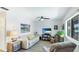 Comfortable living room showcasing sleek floors, natural light, and stylish decor at 117 7Th N St # 14, Bradenton Beach, FL 34217