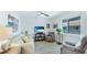 Bright living space with updated flooring, comfortable seating, and stylish accents at 117 7Th N St # 14, Bradenton Beach, FL 34217