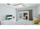 Serene bedroom featuring a balcony with outdoor views and neutral decor at 117 7Th N St # 14, Bradenton Beach, FL 34217