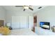 Comfortable main bedroom with bright natural light and white dresser at 117 7Th N St # 14, Bradenton Beach, FL 34217