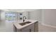 Kitchen island features a stainless steel sink, and stainless steel dishwasher at 11717 Great Brook Ln, Parrish, FL 34219