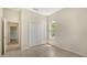 Light and airy bedroom with tile floors, closet, and natural light from one window at 12041 Thornhill Ct, Lakewood Ranch, FL 34202
