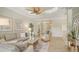 Spacious living area with tile flooring and neutral decor at 12041 Thornhill Ct, Lakewood Ranch, FL 34202