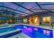 Beautiful backyard pool with an outdoor kitchen perfect for entertaining at 15024 Castle Park Ter, Lakewood Ranch, FL 34202