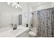 Clean bathroom with vanity, mirror, and tiled shower with tub at 15104 Blue Bay Ter, Lakewood Ranch, FL 34211
