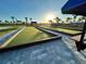 Bocce ball court in the community with manicured lawns and beautiful landscaping at 15104 Blue Bay Ter, Lakewood Ranch, FL 34211