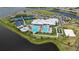 Overhead shot of community amenities with sports courts, recreational pool, and beach volleyball at 15104 Blue Bay Ter, Lakewood Ranch, FL 34211