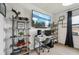 Home office space with desk, shelving, television and natural light at 15104 Blue Bay Ter, Lakewood Ranch, FL 34211