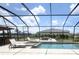 Pool and spa with a screened in enclosure at 15104 Blue Bay Ter, Lakewood Ranch, FL 34211