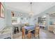 Dining room with pass-through view to kitchen at 152 Jose Gaspar Dr # 152, Englewood, FL 34223