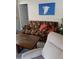 Inviting living room with comfortable seating, stylish decor, and soothing natural light, creating a relaxing atmosphere at 1603 Gulf Dr N # 6, Bradenton Beach, FL 34217