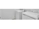 Well-equipped laundry room with a modern washer and dryer at 16097 Old Fox Trl, Port Charlotte, FL 33953