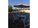 Brick back patio with outdoor furniture and table set for entertaining Gathering and friends at 1750 Gold Ave, Sarasota, FL 34235