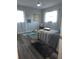 Cozy bedroom with hardwood floors, ceiling fan and plenty of natural light at 1750 Gold Ave, Sarasota, FL 34235