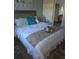 Comfortable bedroom with decorative pillows and a decorative tray at 1750 Gold Ave, Sarasota, FL 34235