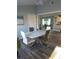 Bright dining room with a modern table and stylish chairs at 1750 Gold Ave, Sarasota, FL 34235