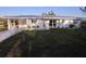 Charming single-story home featuring fresh paint, landscaping, and a well maintained front yard at 1750 Gold Ave, Sarasota, FL 34235